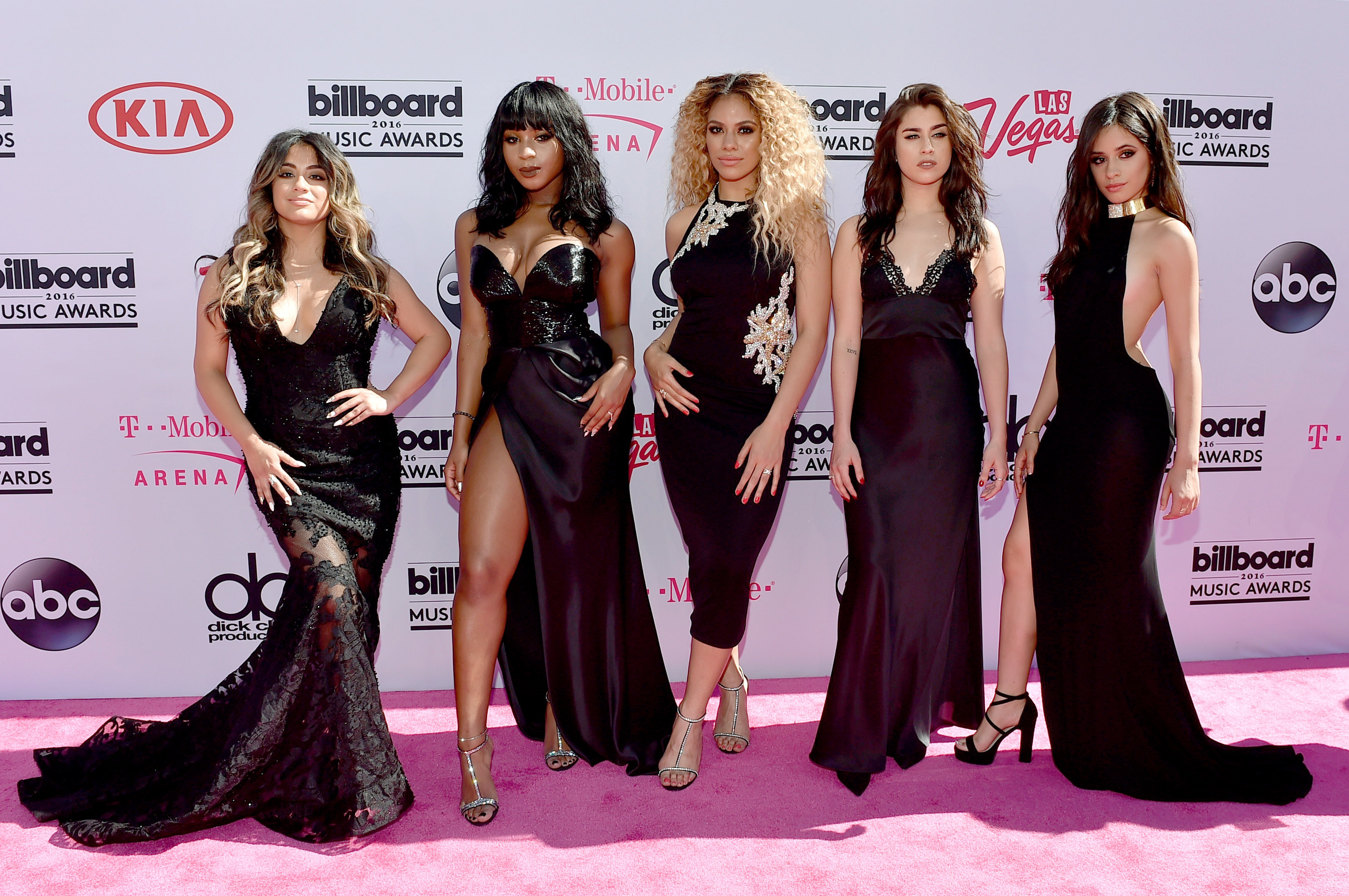 Fifth Harmony pose on a red carpet