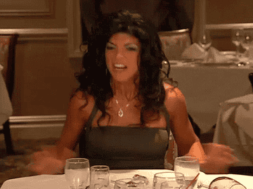 Teresa from &quot;Housewives&quot; flipping over a dinner table