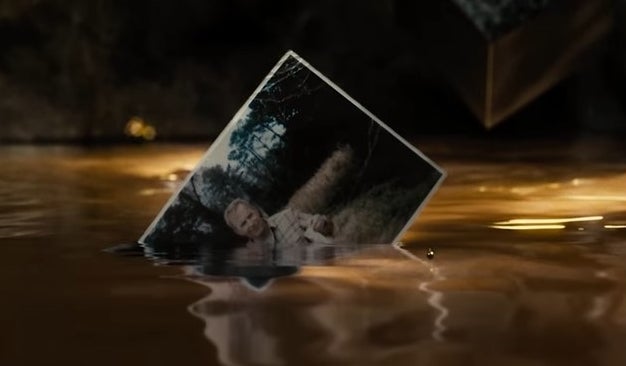 A photo of Jonathan Kent and the Mother Box rising from the waters of the Genesis Chamber in &quot;Zack Snyder&#x27;s Justice League&quot;
