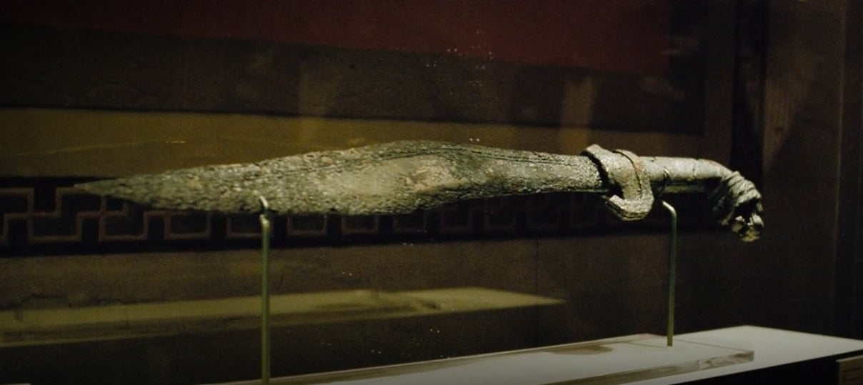 A replica of the Sword of Alexander on display at a gala in "Batman v Superman: Dawn of Justice"
