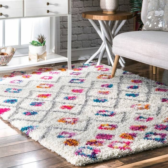 the white and multicolored shag rug