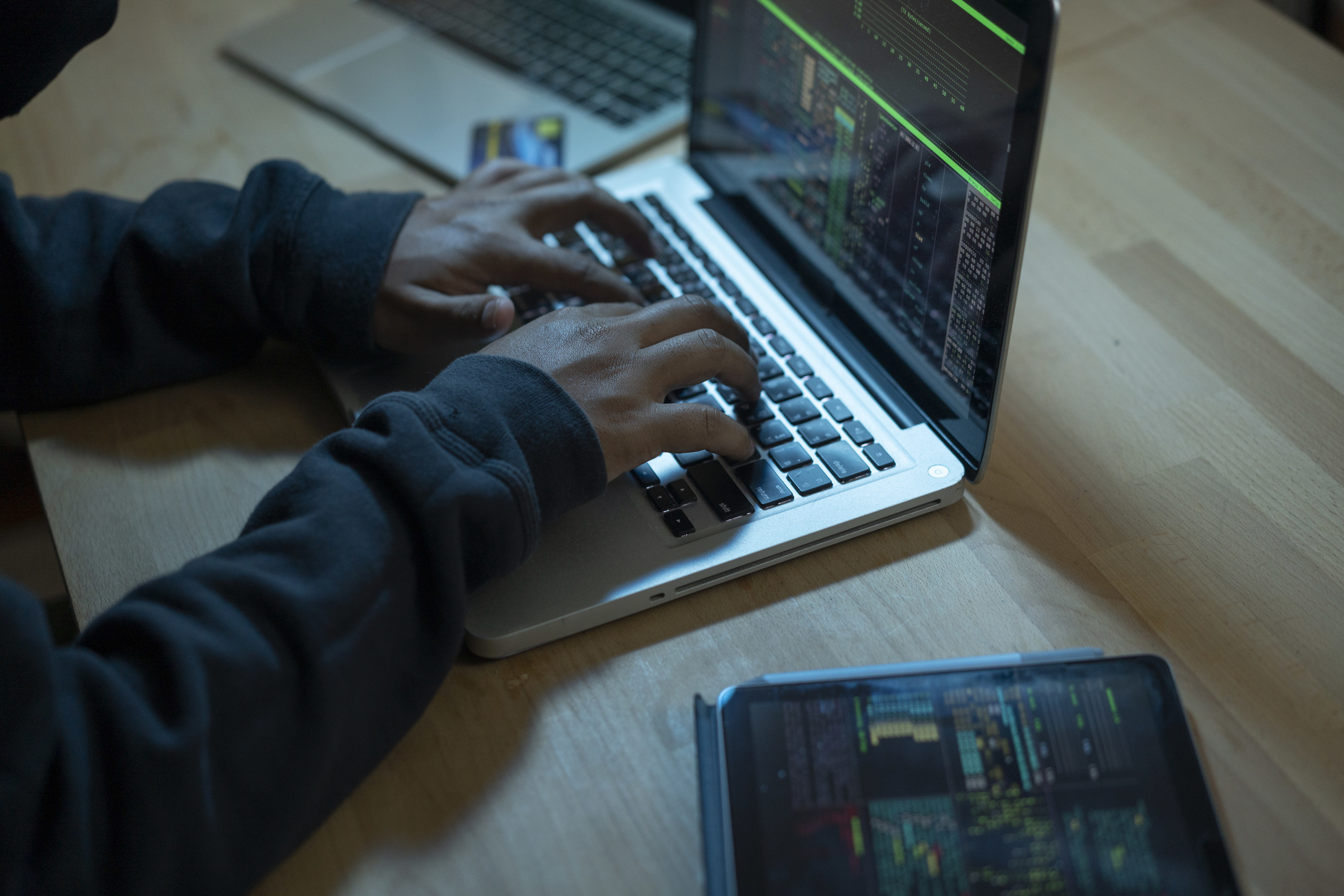 Person typing on a computer keyboard