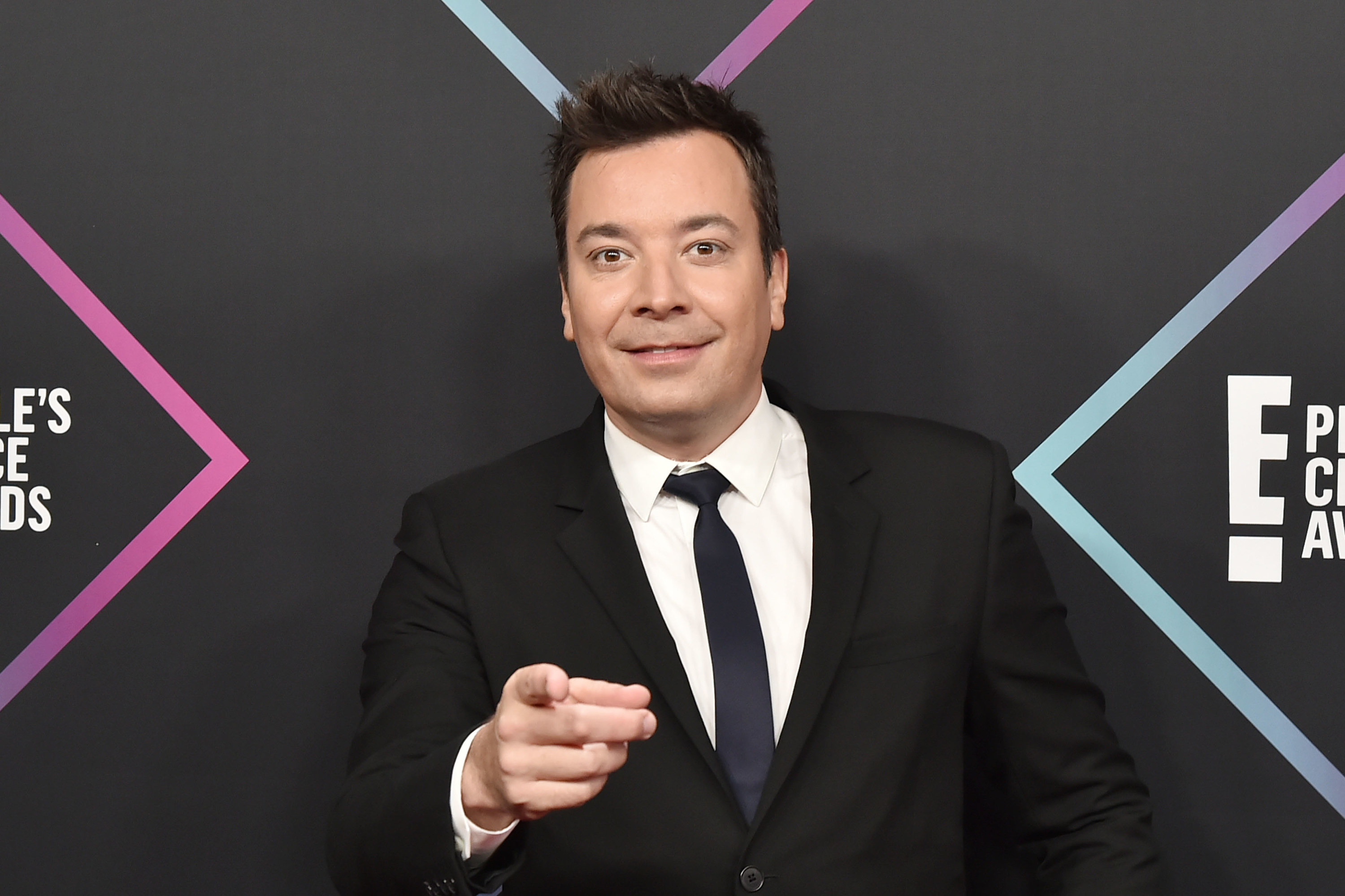 Jimmy pointing at the camera on the red carpet