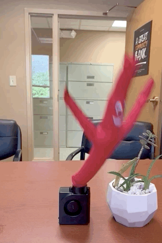 a gif of the wacky arm guy dancing