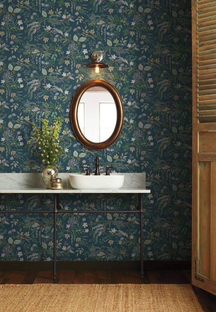 The juniper forest wallpaper in a bathroom