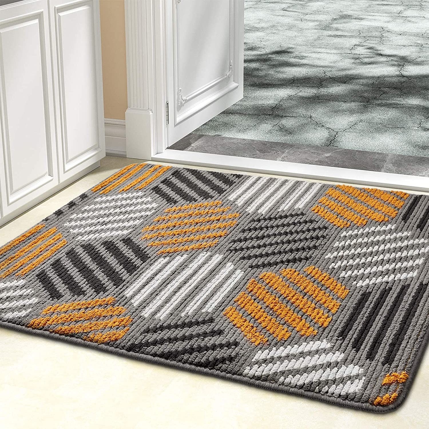 a large entryway mat by a front door