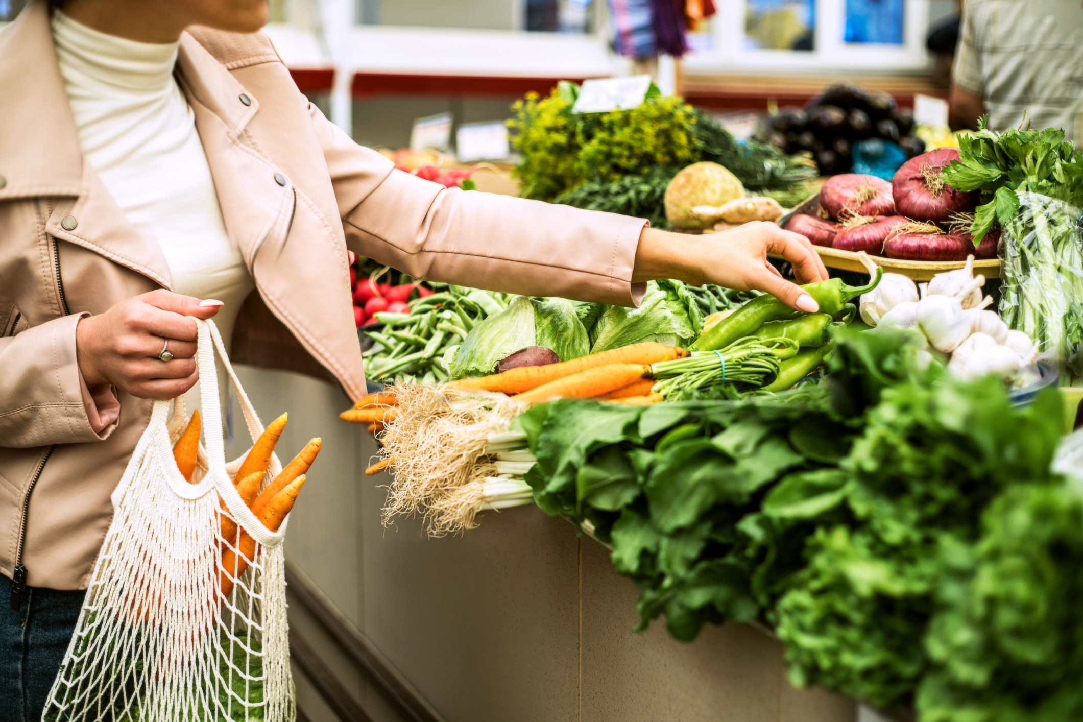 Someone perusing produce