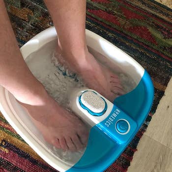Reviewer's feet in Homedics foot spa