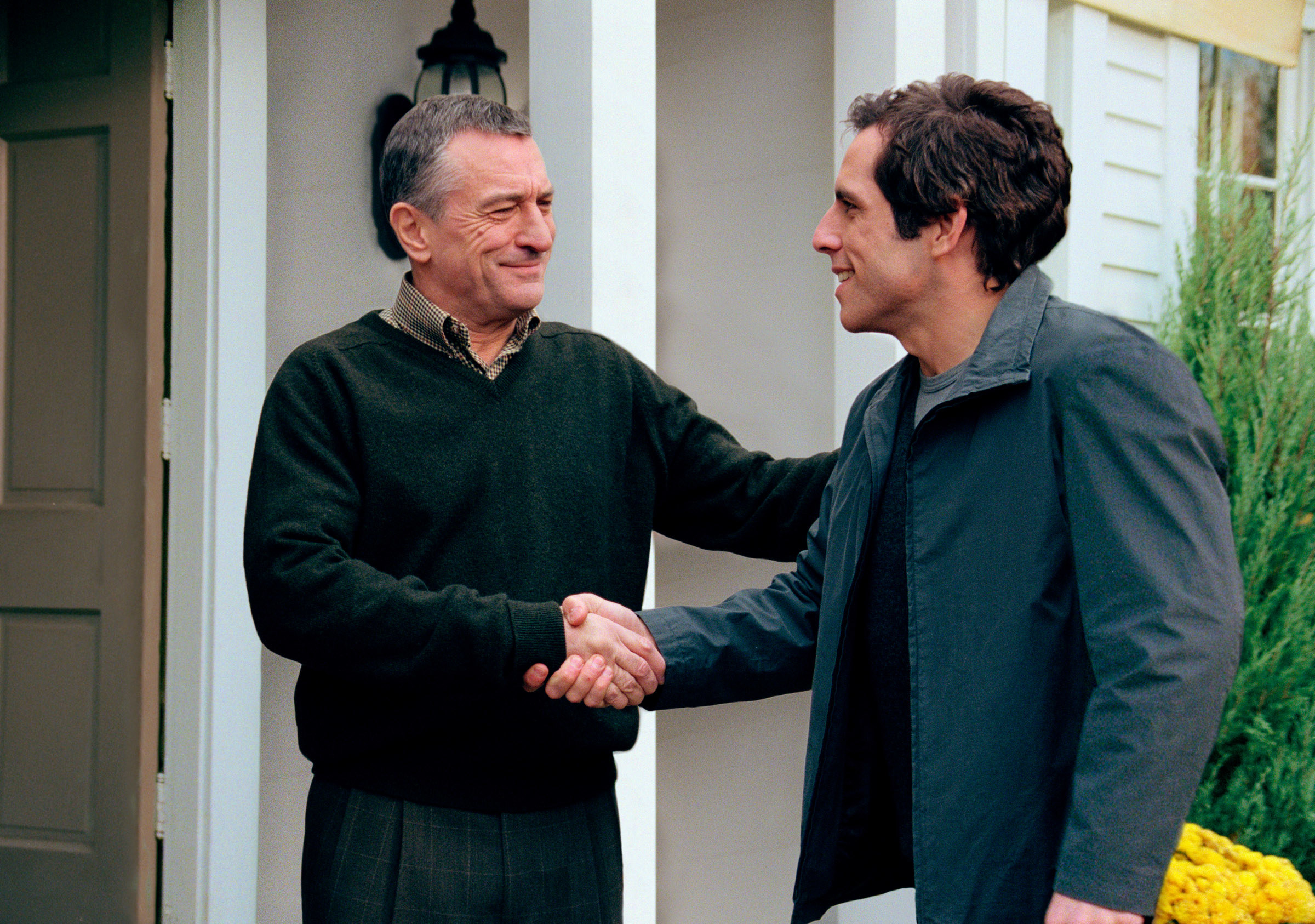 Robert De Niro and Ben Stiller shaking hands