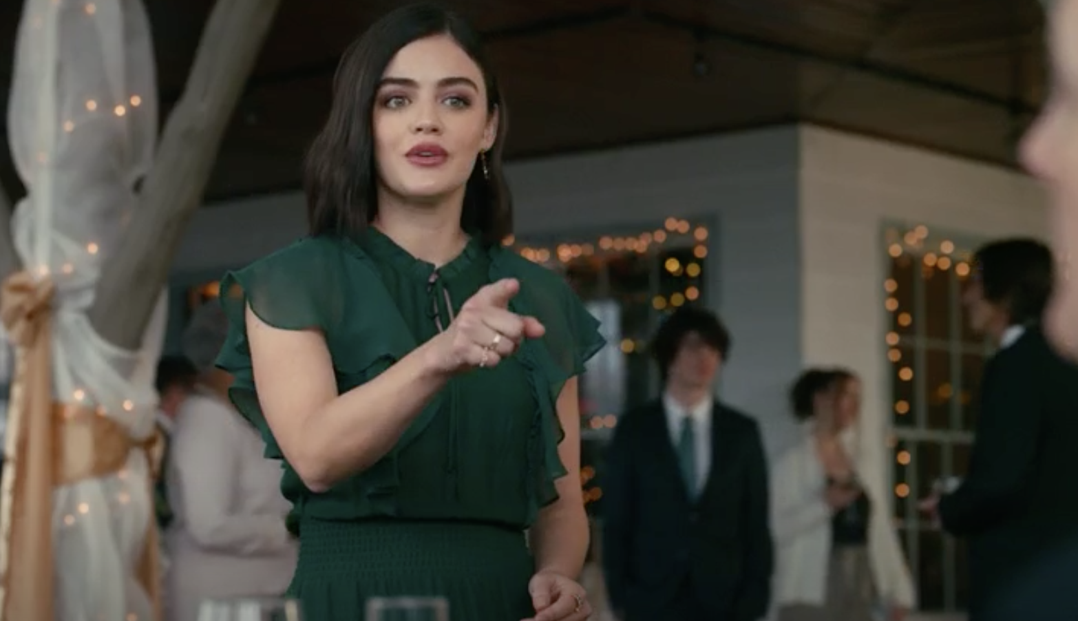 lucy in green dress at wedding