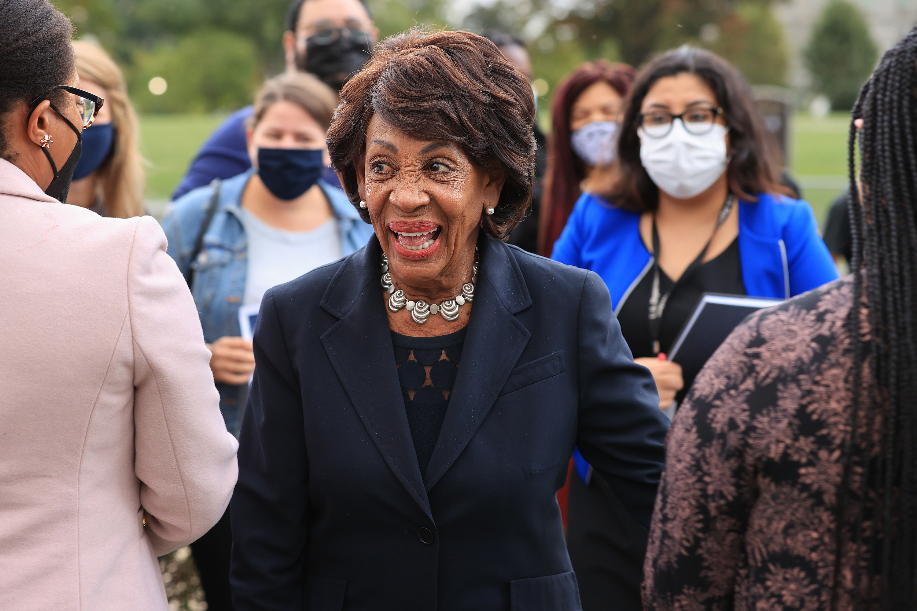 Maxine Waters speaking with activists