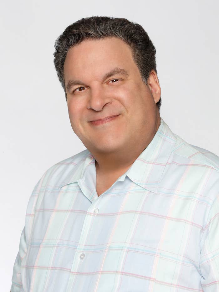 Jeff Garlin smiles in a promotional image for The Goldbergs