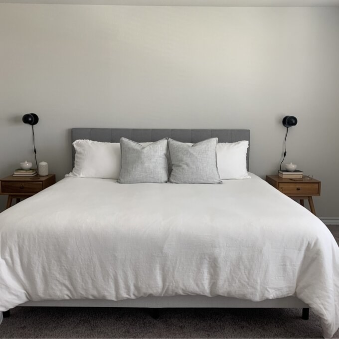 a reviewer photo of the headboard in gray