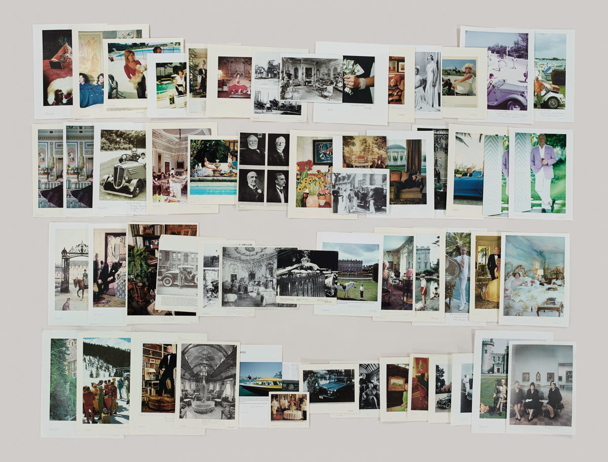 Two rows of photos of wealth in color and black and white laid out on a blank surface