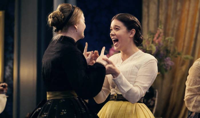 Hailee Steinfeld smiling in a scene from Dickinson