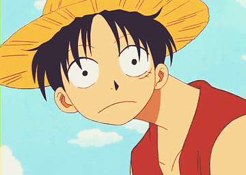 Luffy giving a huge smile to someone