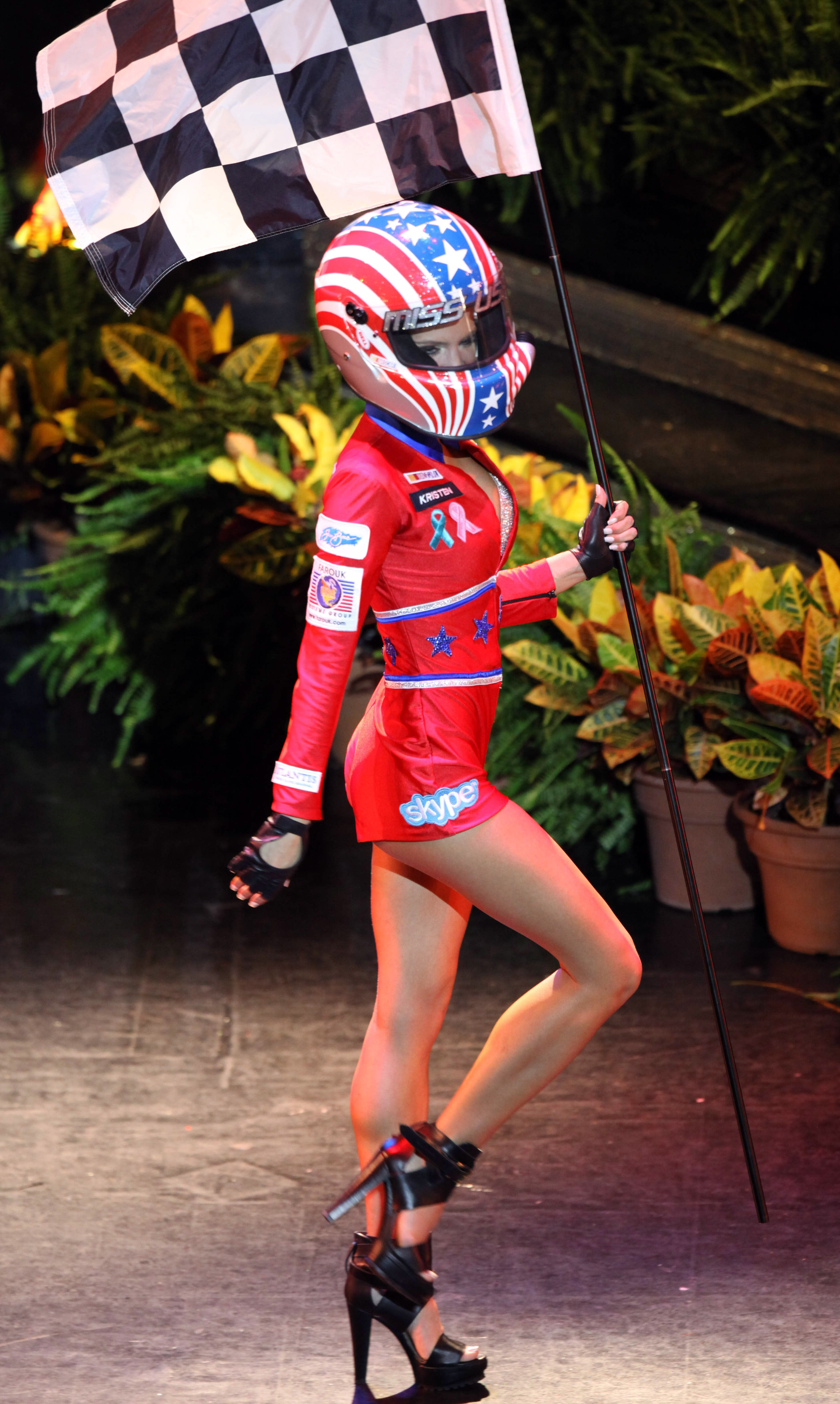 a woman dressed up in nascar clothes