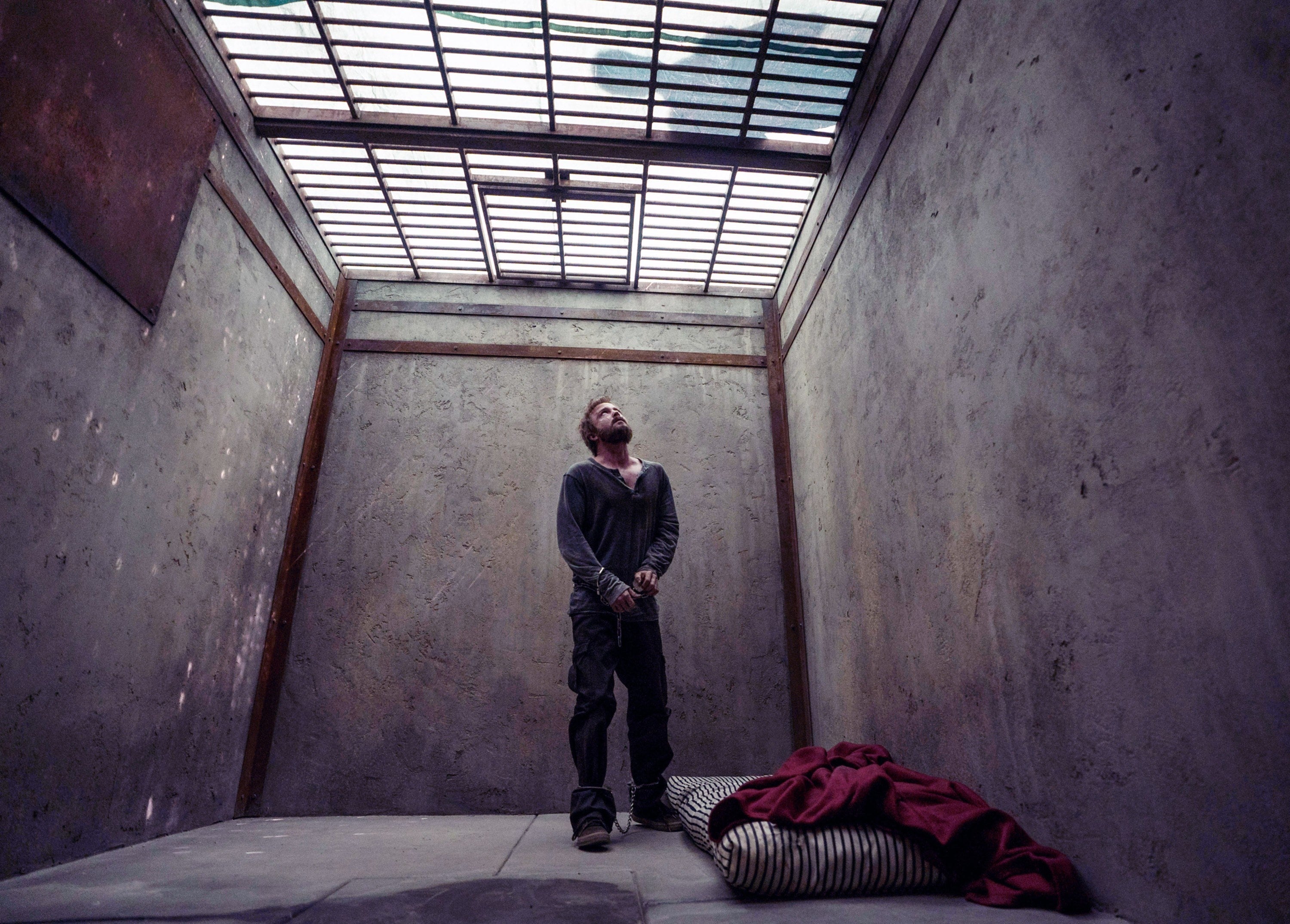 Jesse in his cell, looking up
