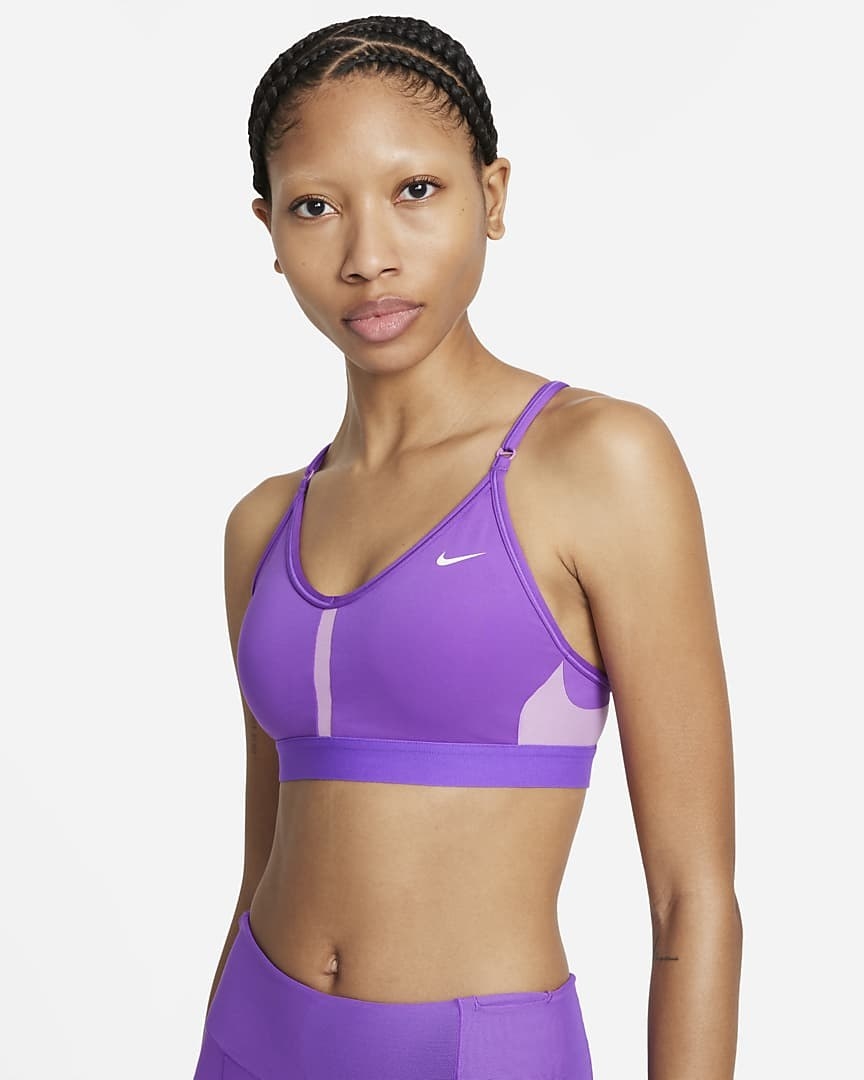 Model wearing the purple sports bra