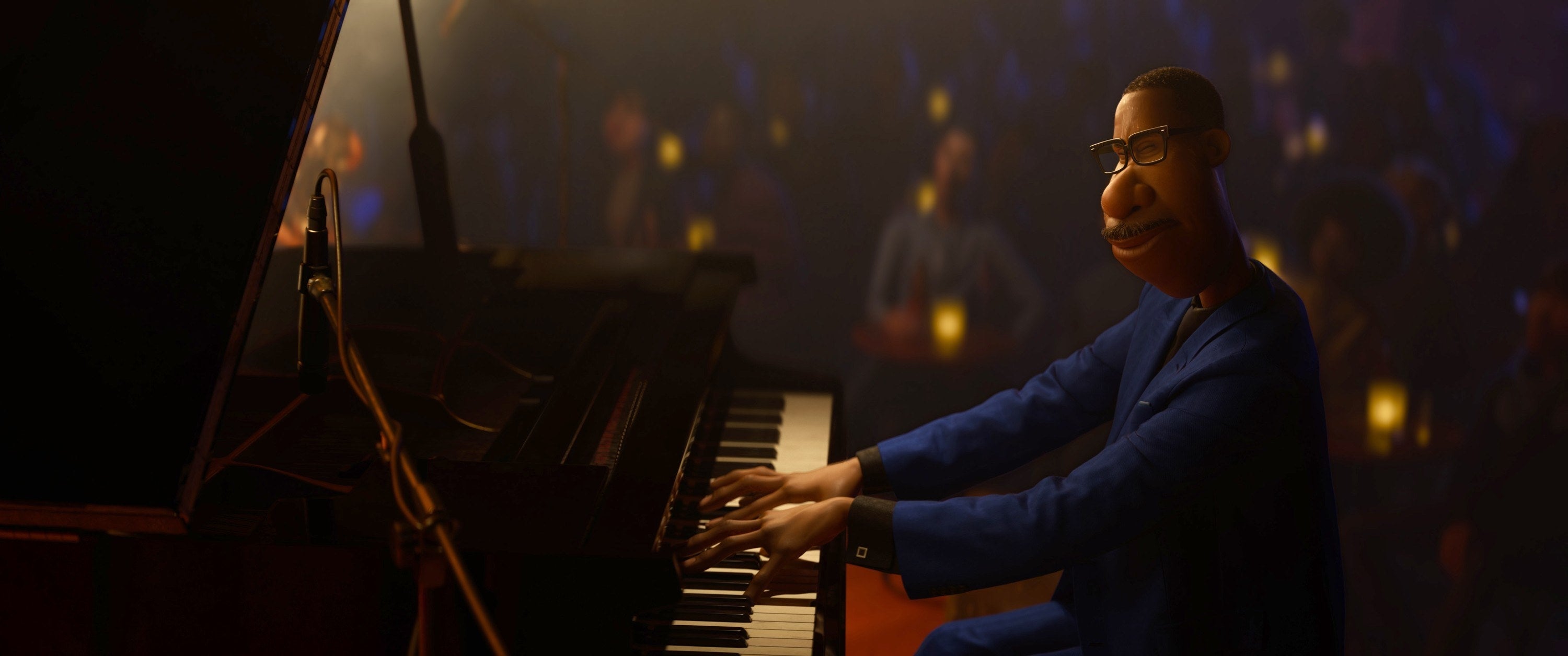 Joe playing piano at a jazz bar