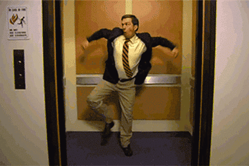 Andy from &quot;The Office&quot; doing a victory dance in the elevator as the doors close