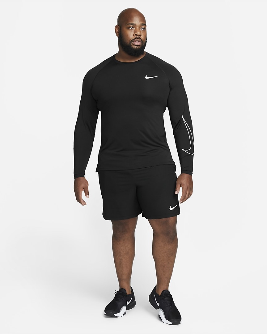 Model wearing the black long sleeve with shorts