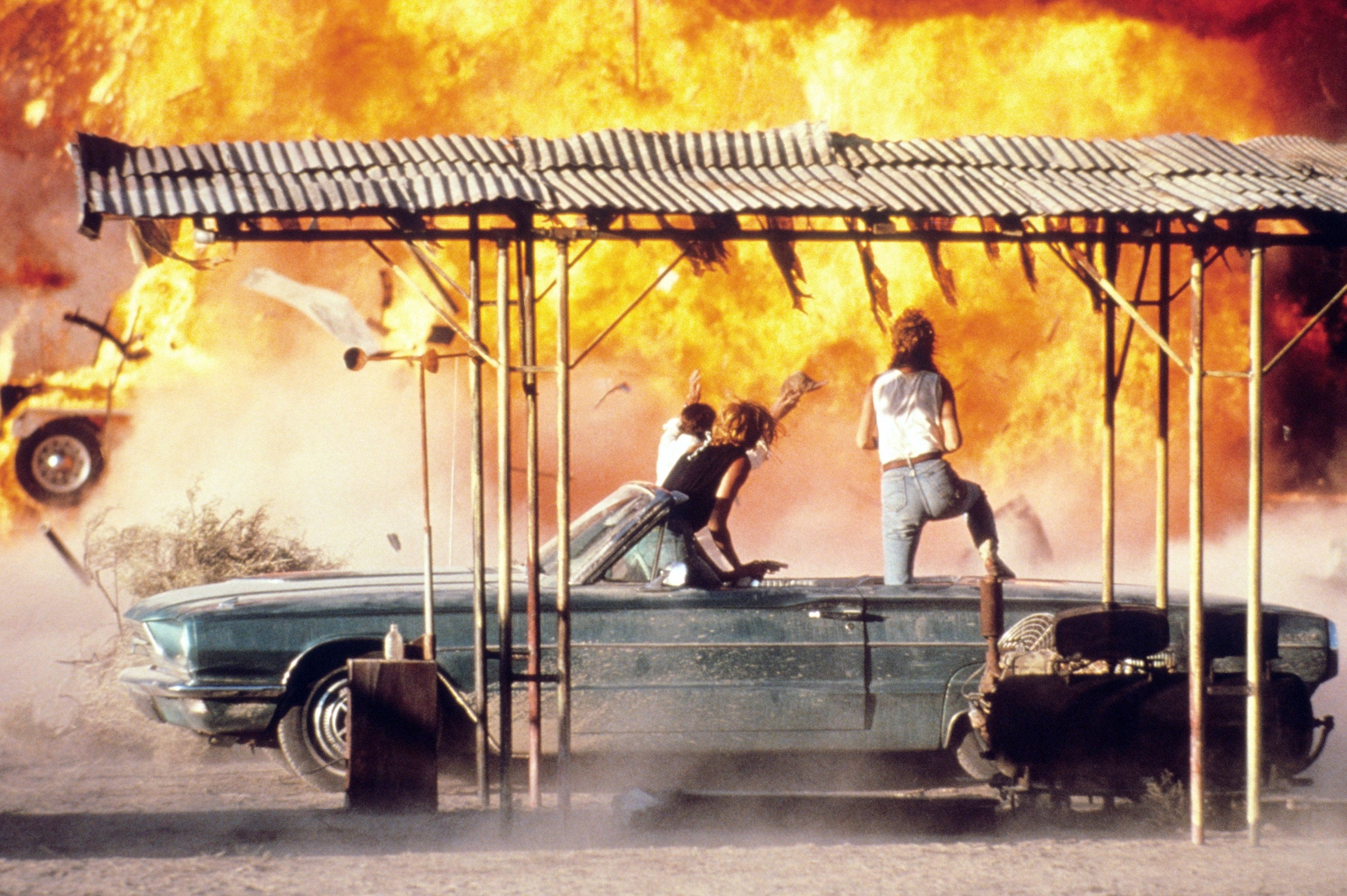 Thelma and Louise watching an explosion