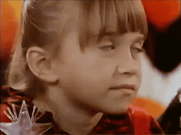 Ashley Olsen as a child rolling her eyes