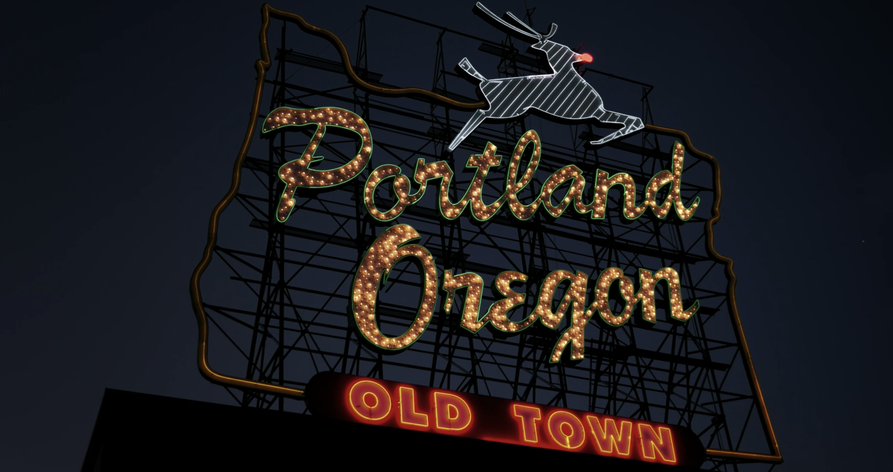 A rooftop sign that says &quot;Portland Oregon&quot;