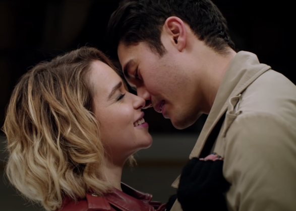 Emilia Clarke and Henry Golding kissing