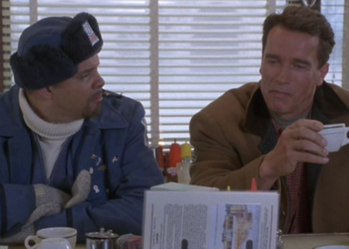 Sinbad and Arnold Schwarzenegger drinking coffee at a diner