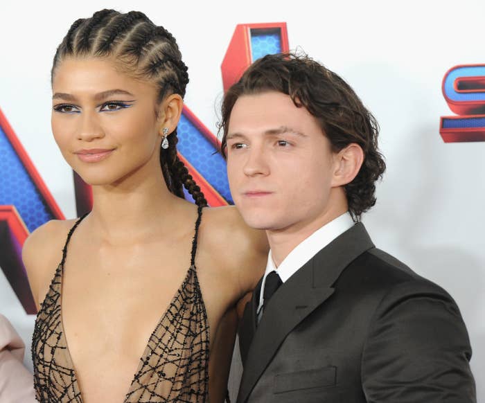 Tom Holland poses with Zendaya on the red carpet
