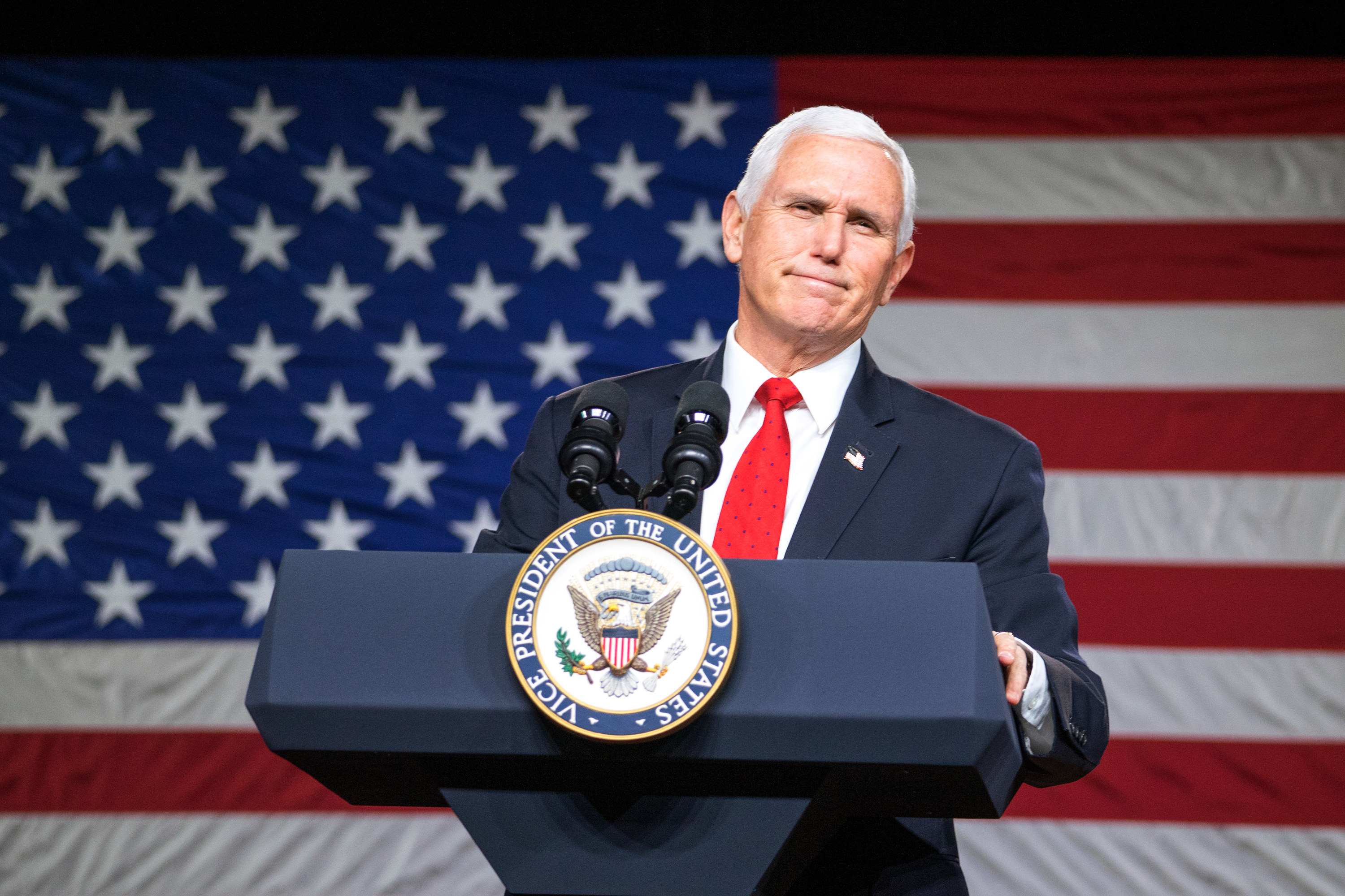 Mike Pence standing behind a podium