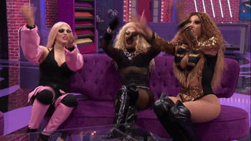 queens voguing on a couch