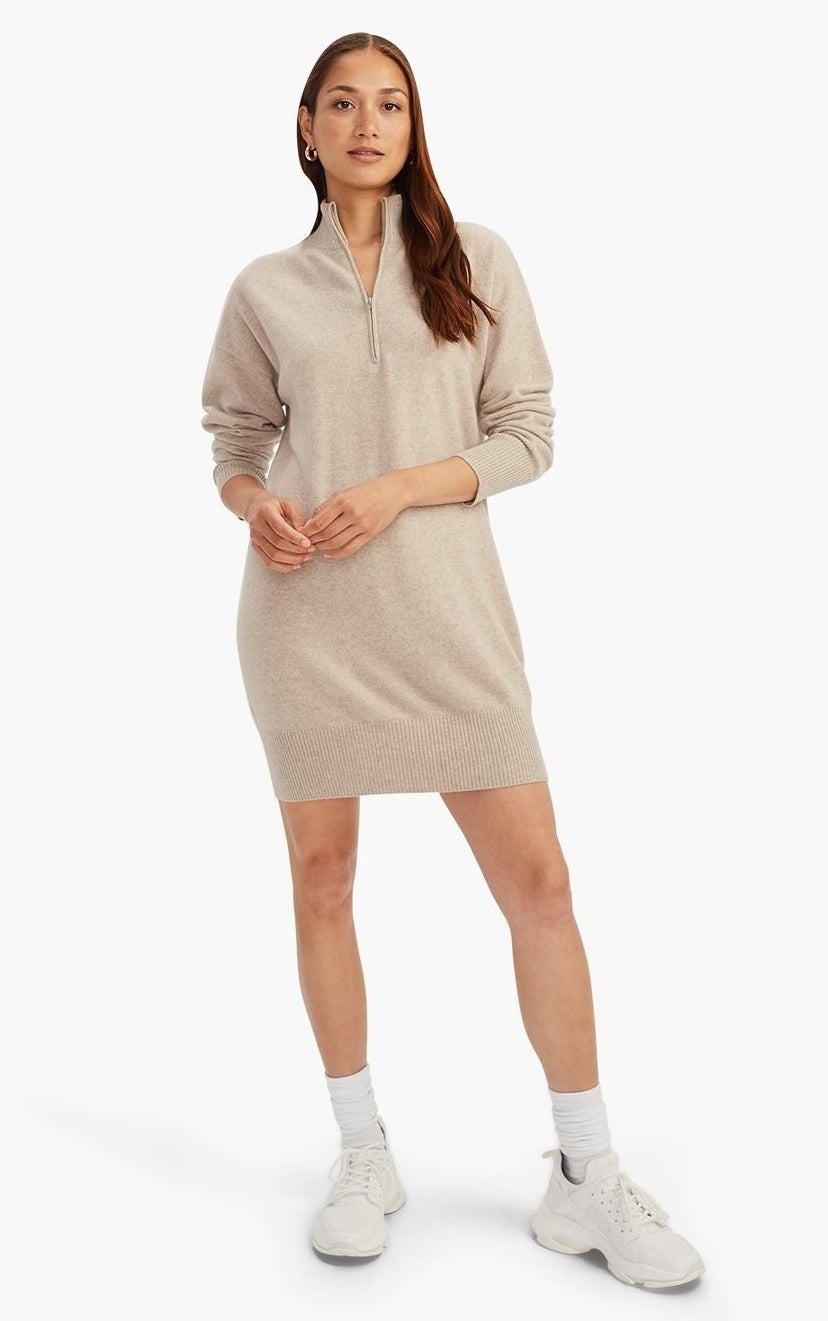 model wearing oatmeal colored dress