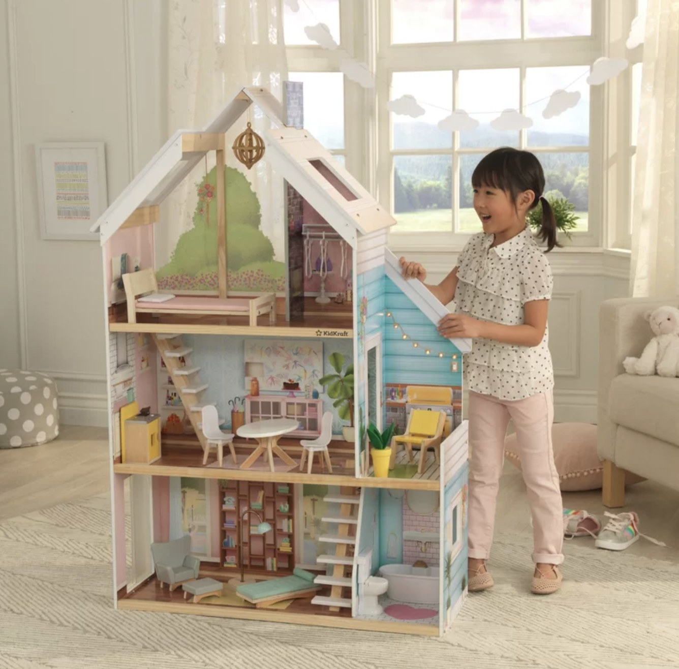 Kid with doll house