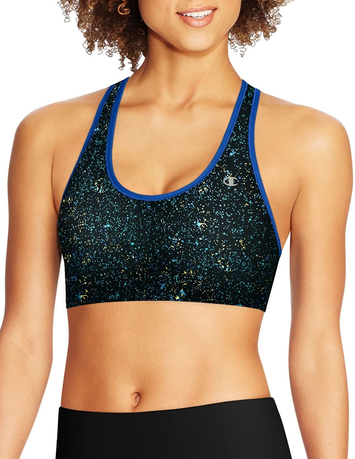 model wears black sports bra with blue and gold speckled design throughout