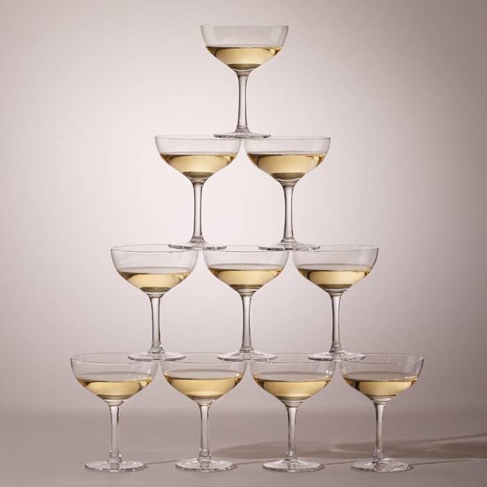 The filled champagne glasses in a tower