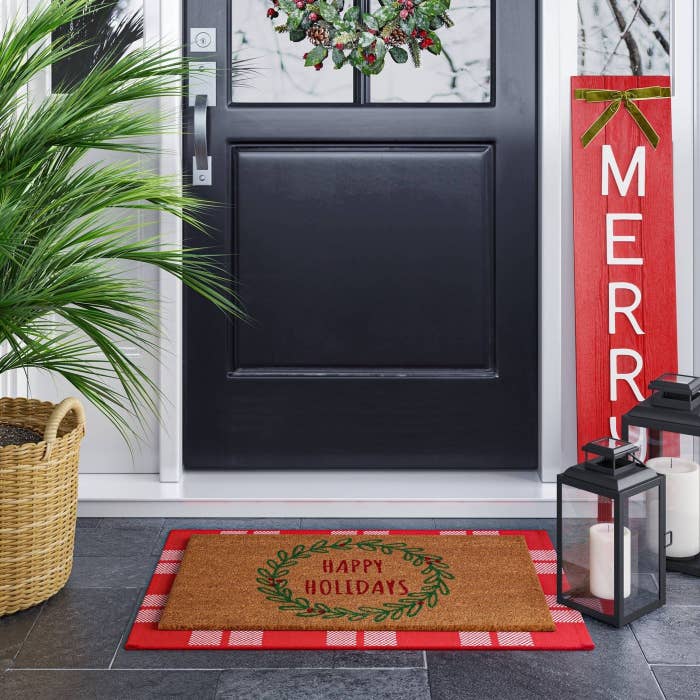 the happy holidays doormat