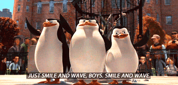 three penguins from &quot;madagascar&quot; waving at onlookers in the zoo, as the middle penguin says &quot;just smile and wave boys, smile and wave&quot;