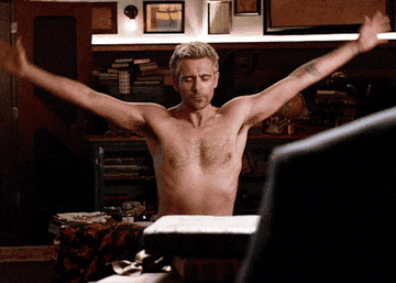 constantine from legend&#x27;s of tomorrow doing yoga topless in the library