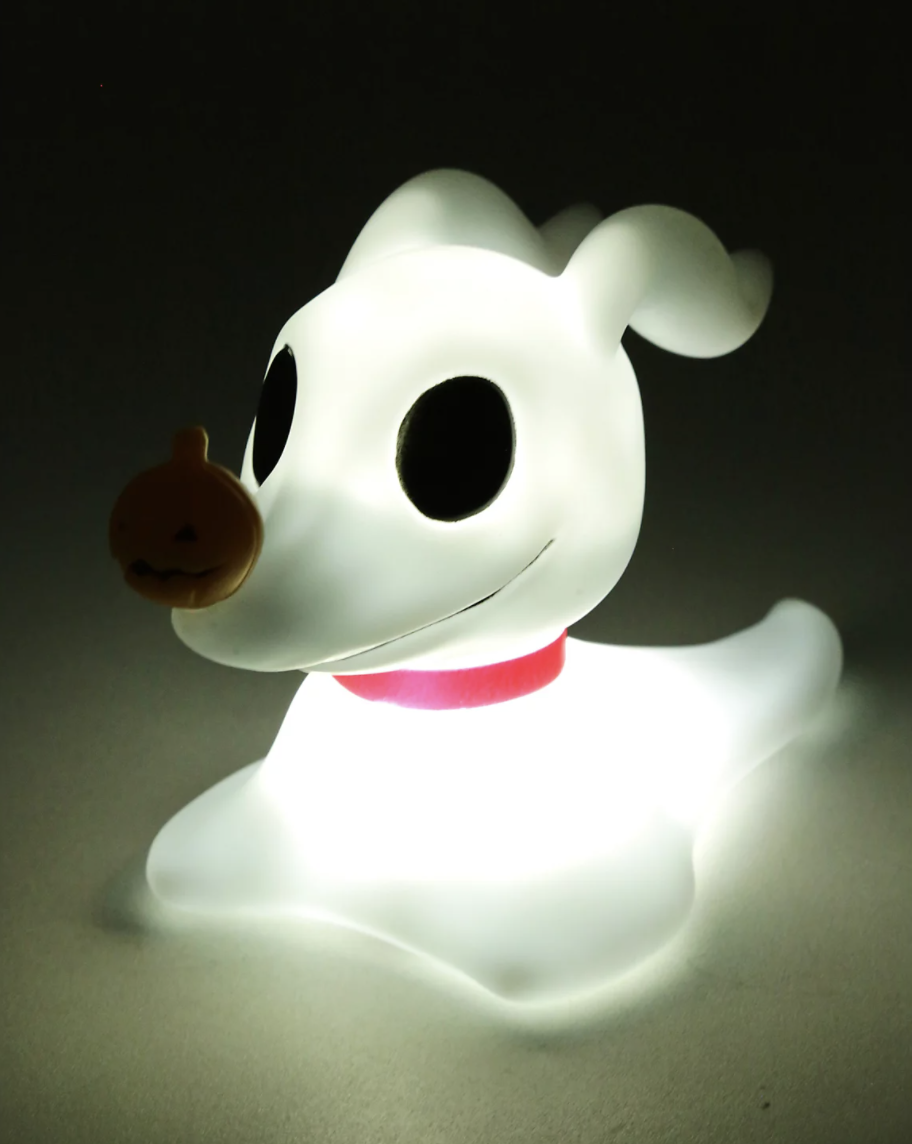 A lamp shaped like the dog Zero from nightmare before christmas