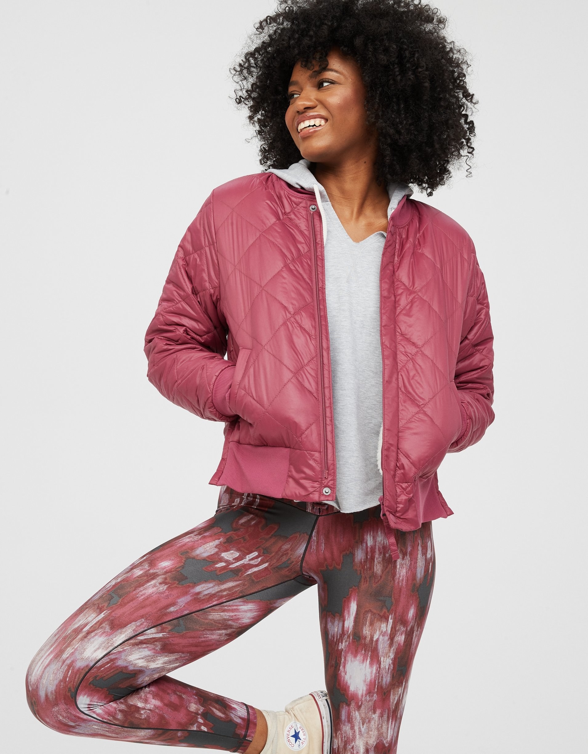 model in the pink bomber jacket with pockets