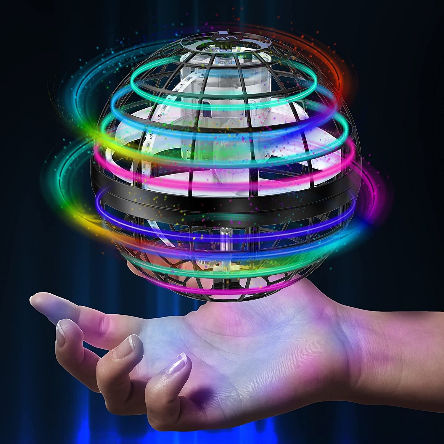 Glowing ball toy hovering above hand