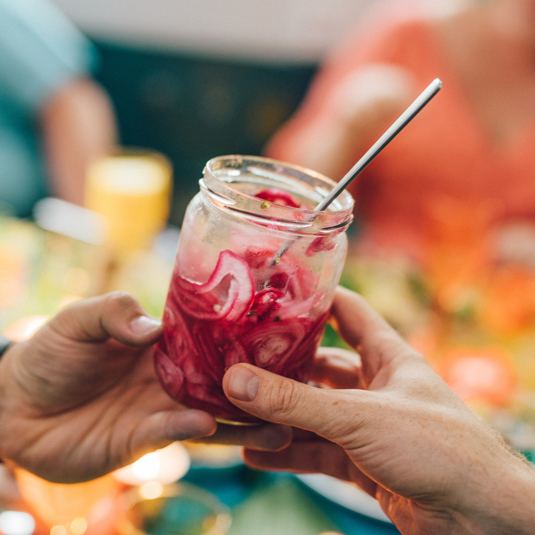 Pickled red onion in a jar.