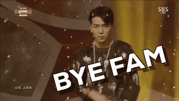 A member of a K-pop band waving with a graphic saying &quot;bye fam&quot;