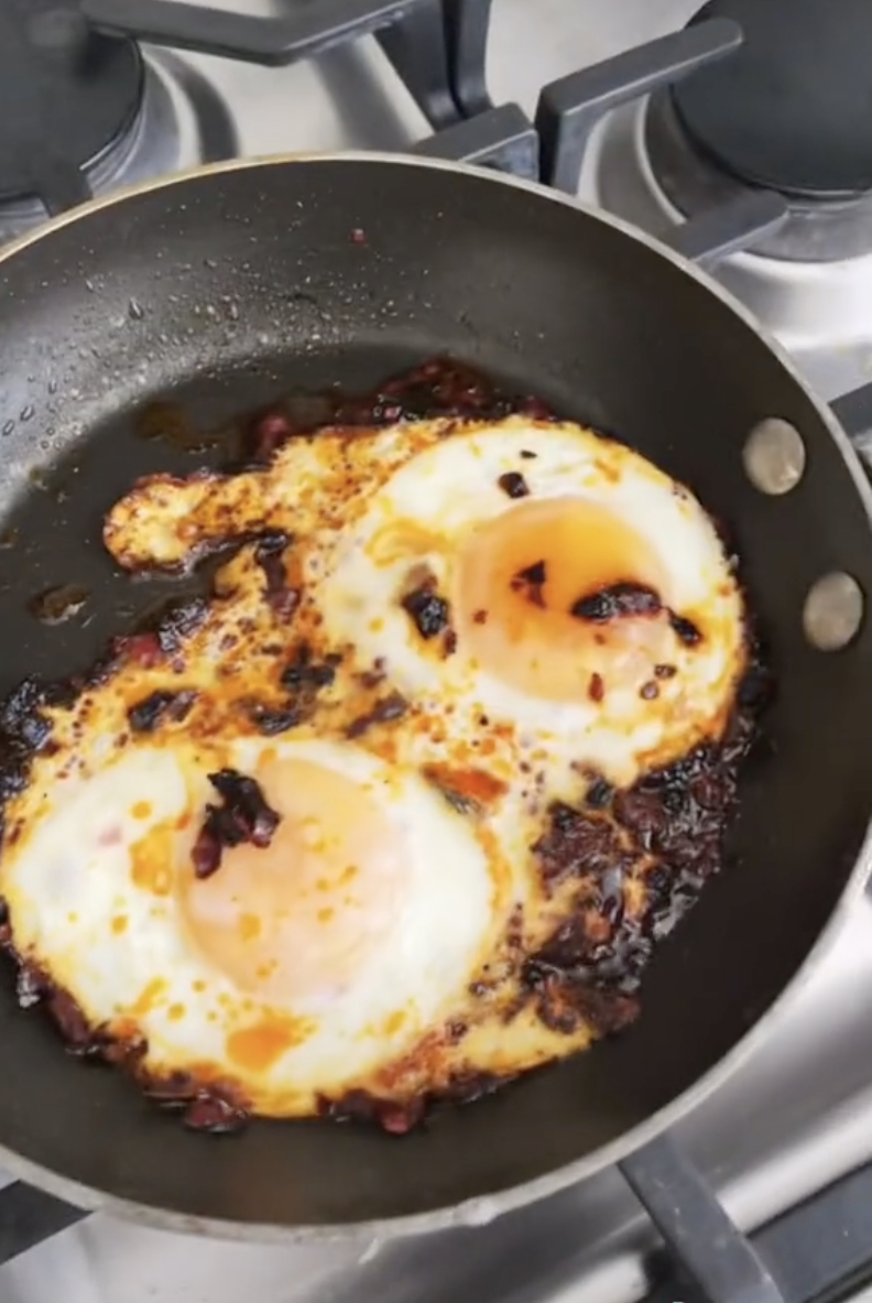 Two eggs fried in chili oil