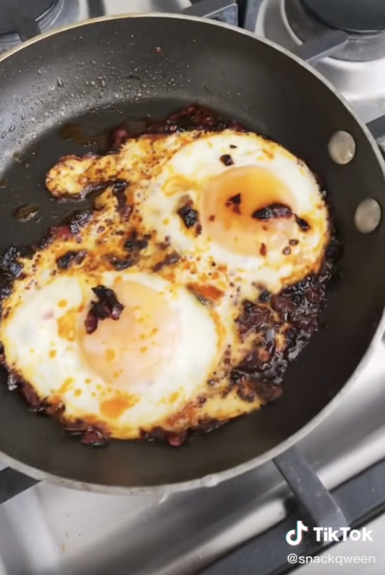 Two eggs fried in chili oil