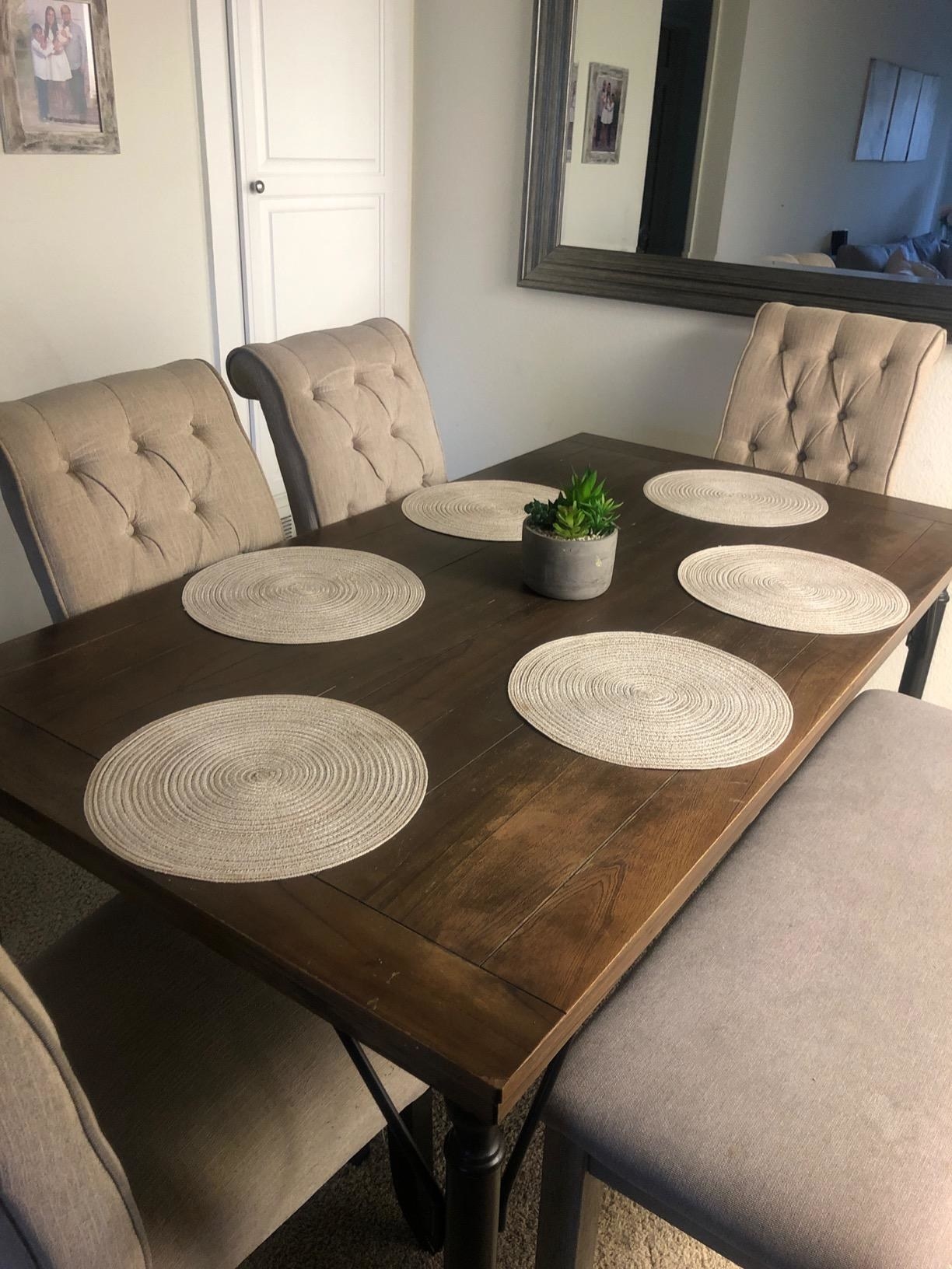 Reviewer photo of the beige placemats on a table