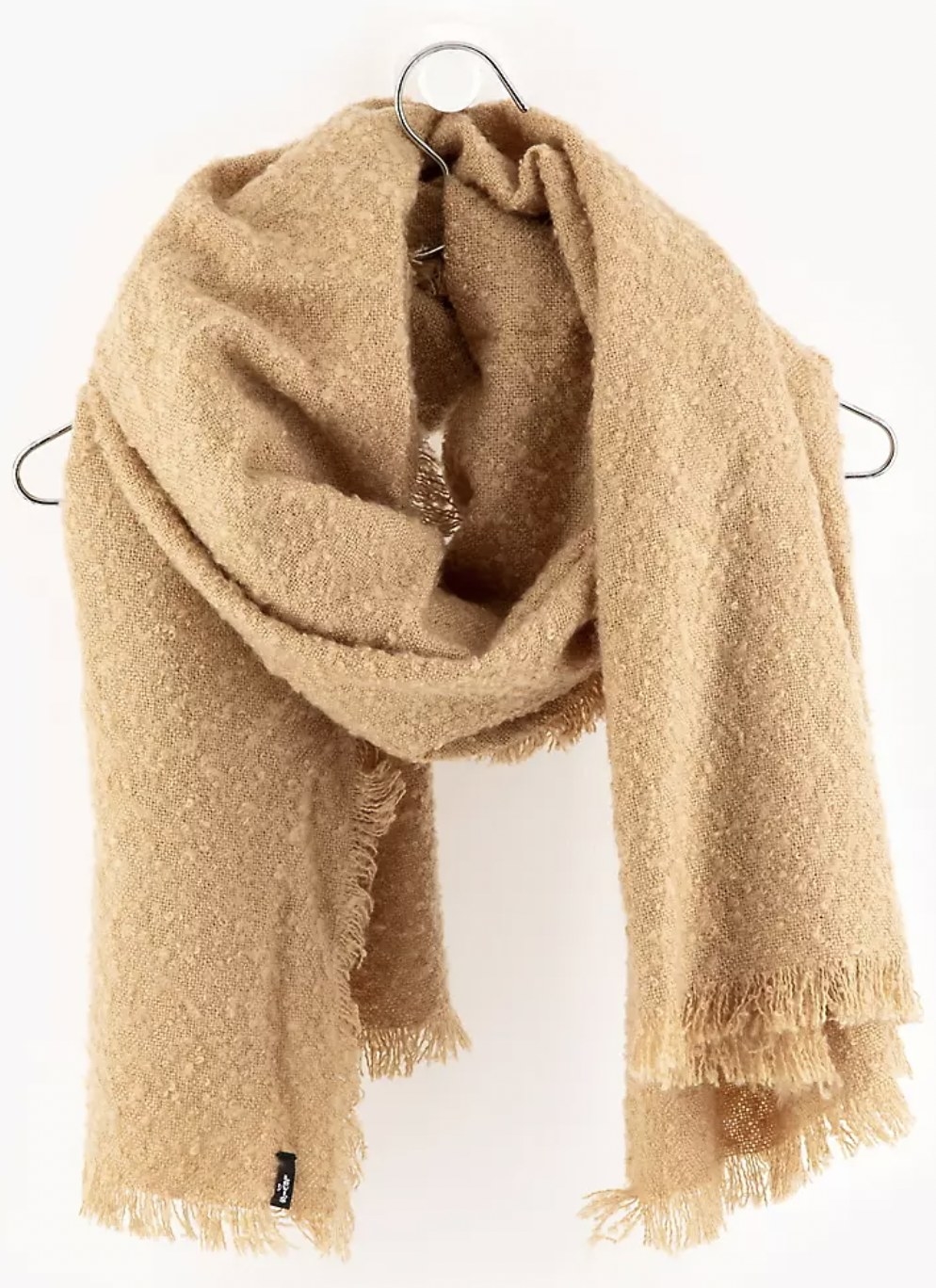 the scarf in beige around a hanger